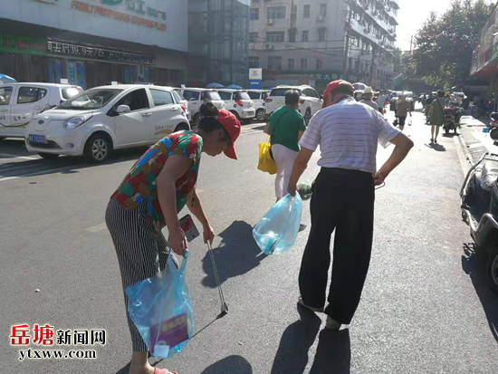 党建领航 九洲社区组织党员志愿者开展卫生大清扫